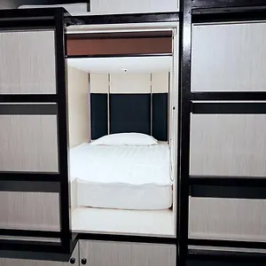 Kapsula Капсульный отель